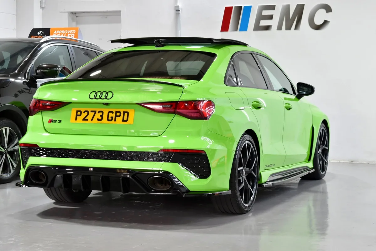 Kyalami Green Audi RS3 Sportback Quattro rear three-quarter view in the East Midland Cars Leicester showroom